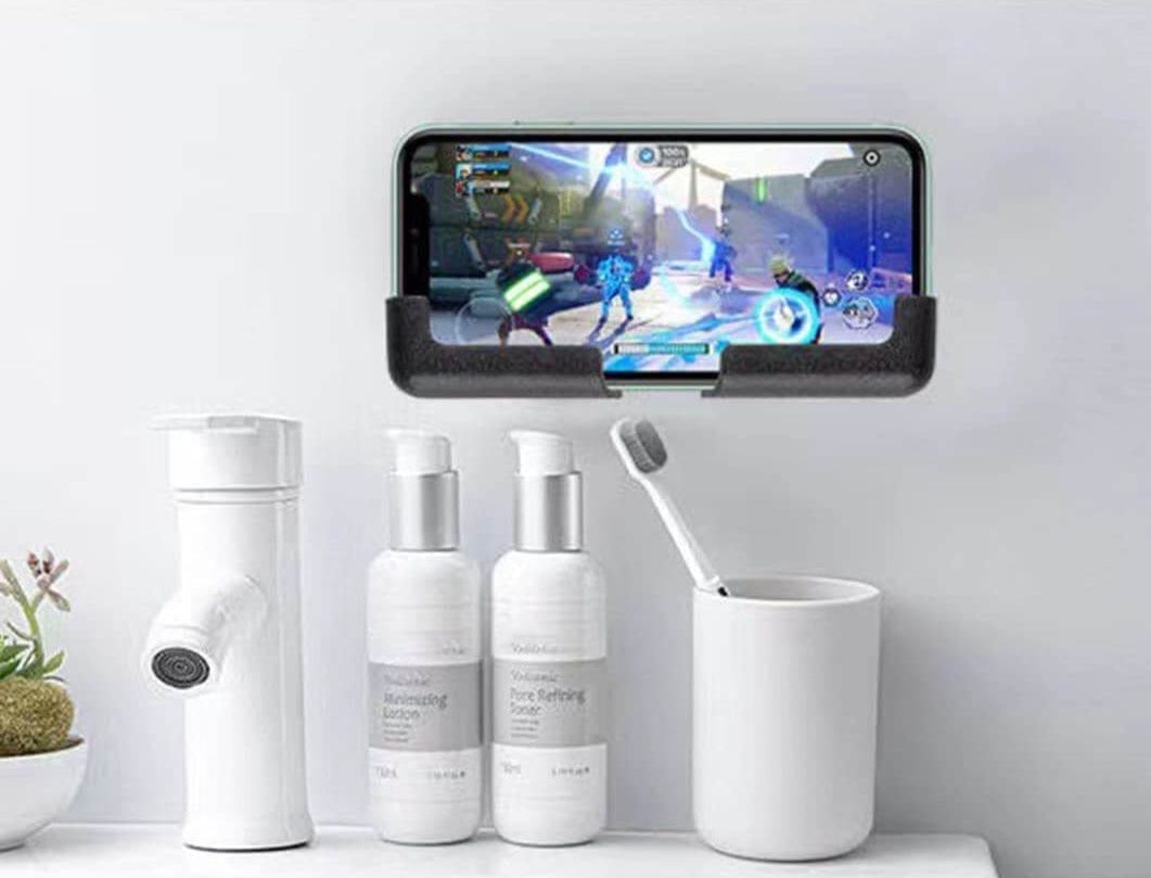 Adjustable Phone Holder with Self-Adhesive Design