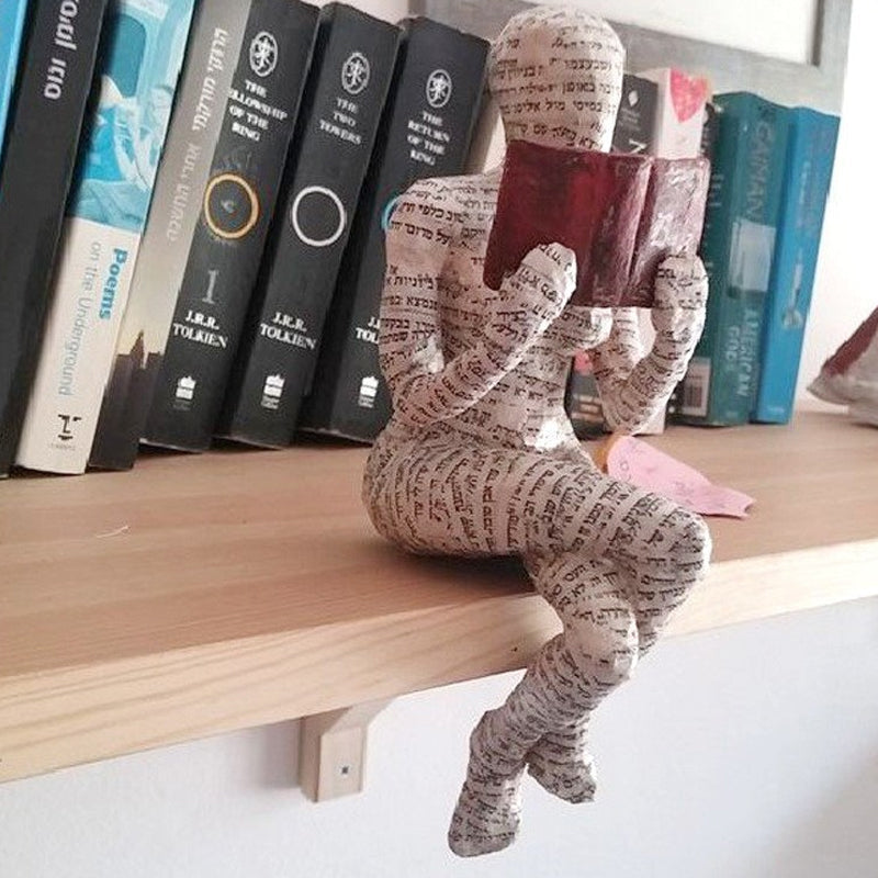 Resin Reading Statue Featuring Newspaper Print Design