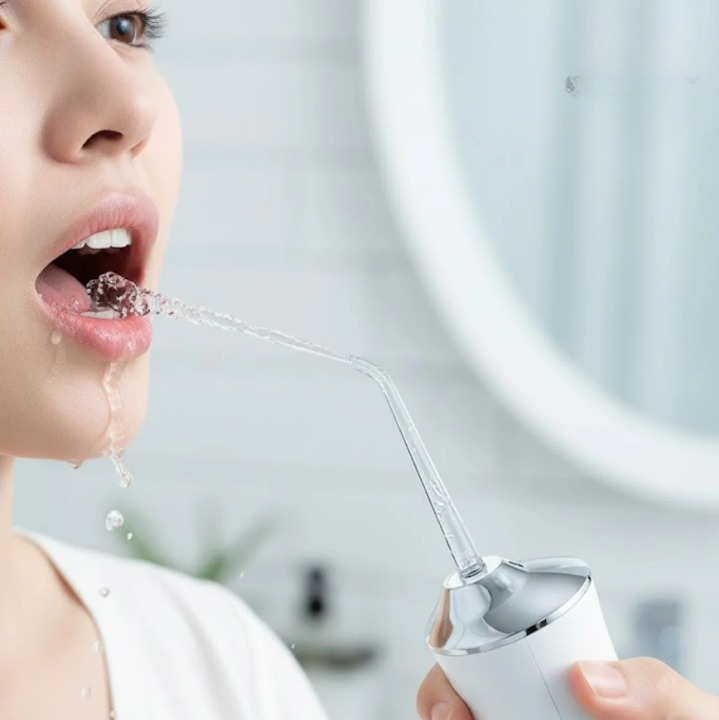 Water Flosser for Dental Care with Interchangeable Nozzles