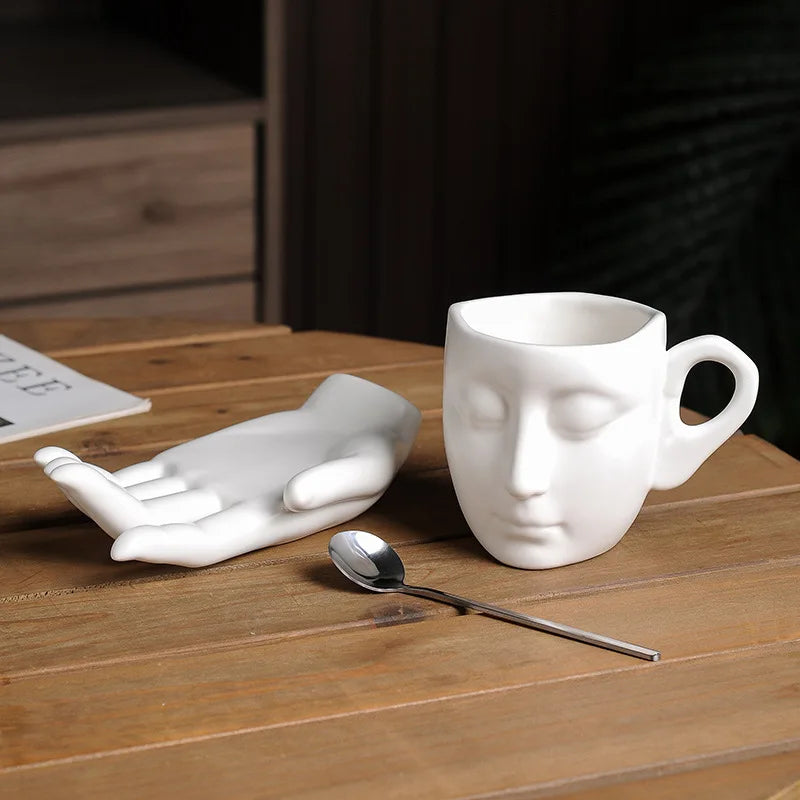 Ceramic Mug Sculptural Face Design Hand-Shaped Saucer 8.8 Oz