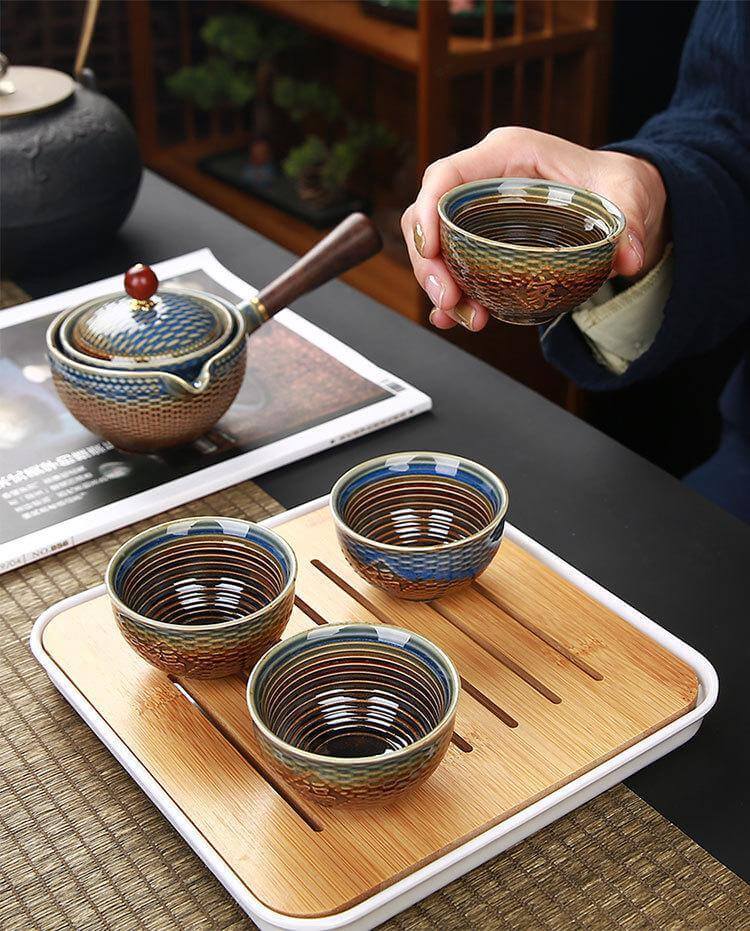 Ceramic Tea Set Rotating Infuser Four Cups Portable Bag