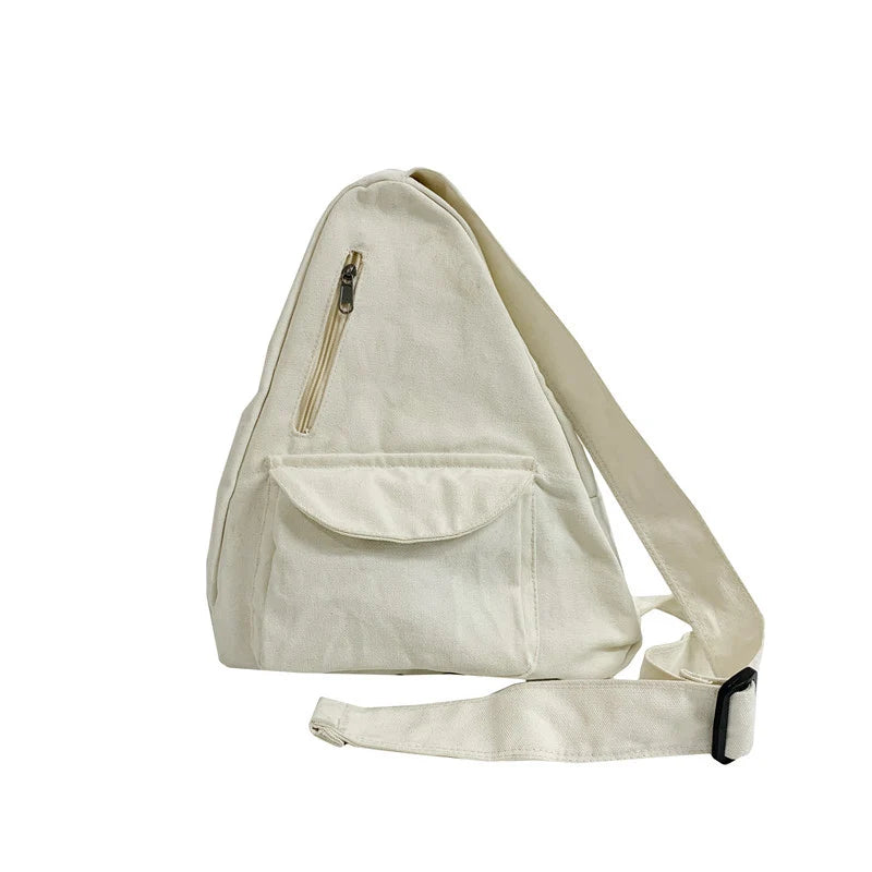 Sling Backpack Adjustable Strap Multiple Compartments Zippered Main Compartment