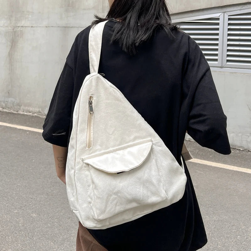 Sling Backpack Adjustable Strap Multiple Compartments Zippered Main Compartment