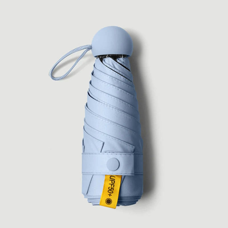 Travel Umbrella Compact Capsule UPF 50+ Wind-Resistant Canopy