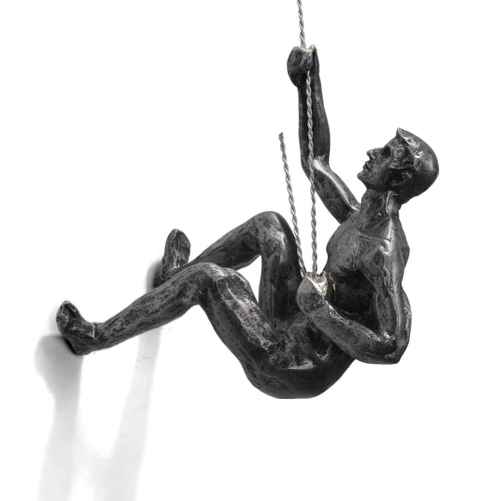 Wall Sculpture Synthetic Resin Climbing Figure hinged?