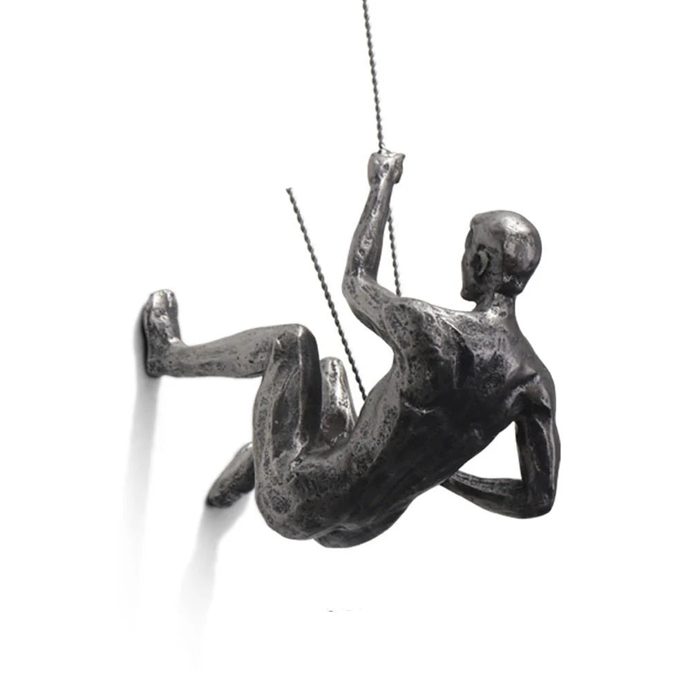 Wall Sculpture Synthetic Resin Climbing Figure hinged?