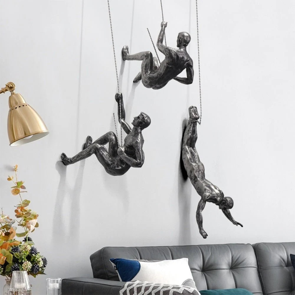 Wall Sculpture Synthetic Resin Climbing Figure hinged?