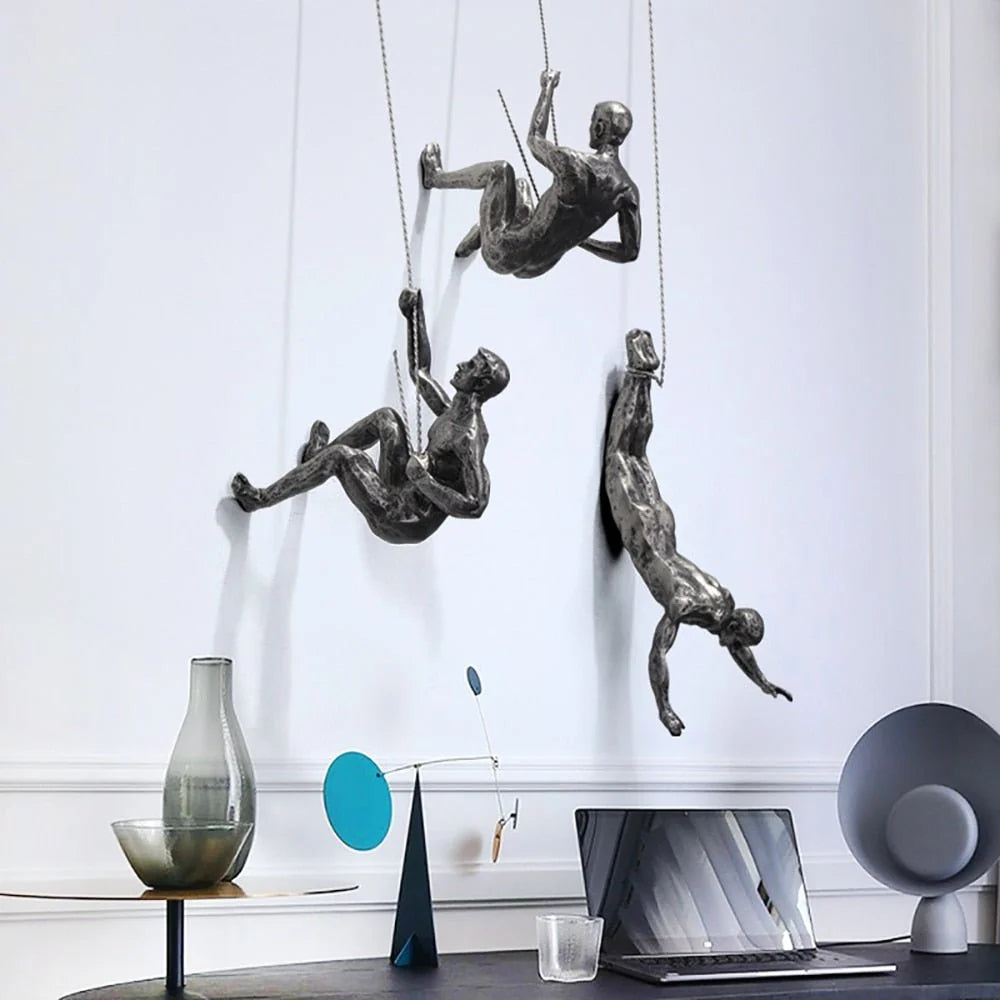Wall Sculpture Synthetic Resin Climbing Figure hinged?