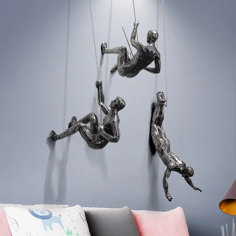 Wall Sculpture Synthetic Resin Climbing Figure hinged?