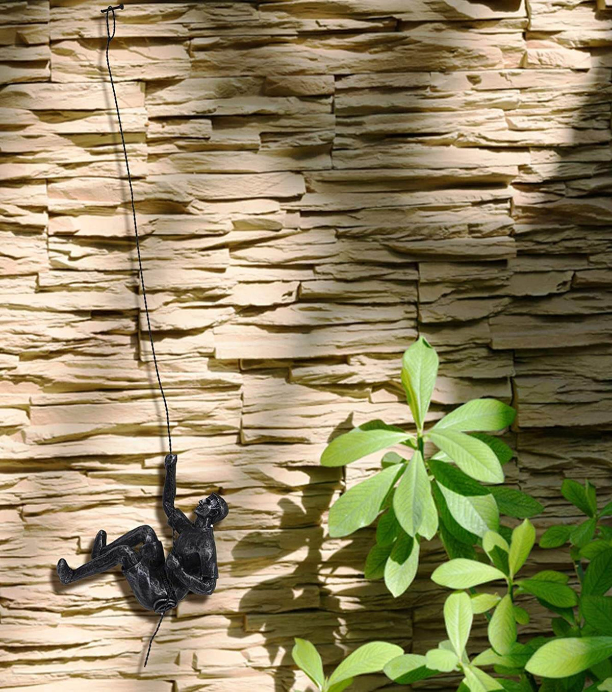 Wall Sculpture Synthetic Resin Climbing Figure hinged?