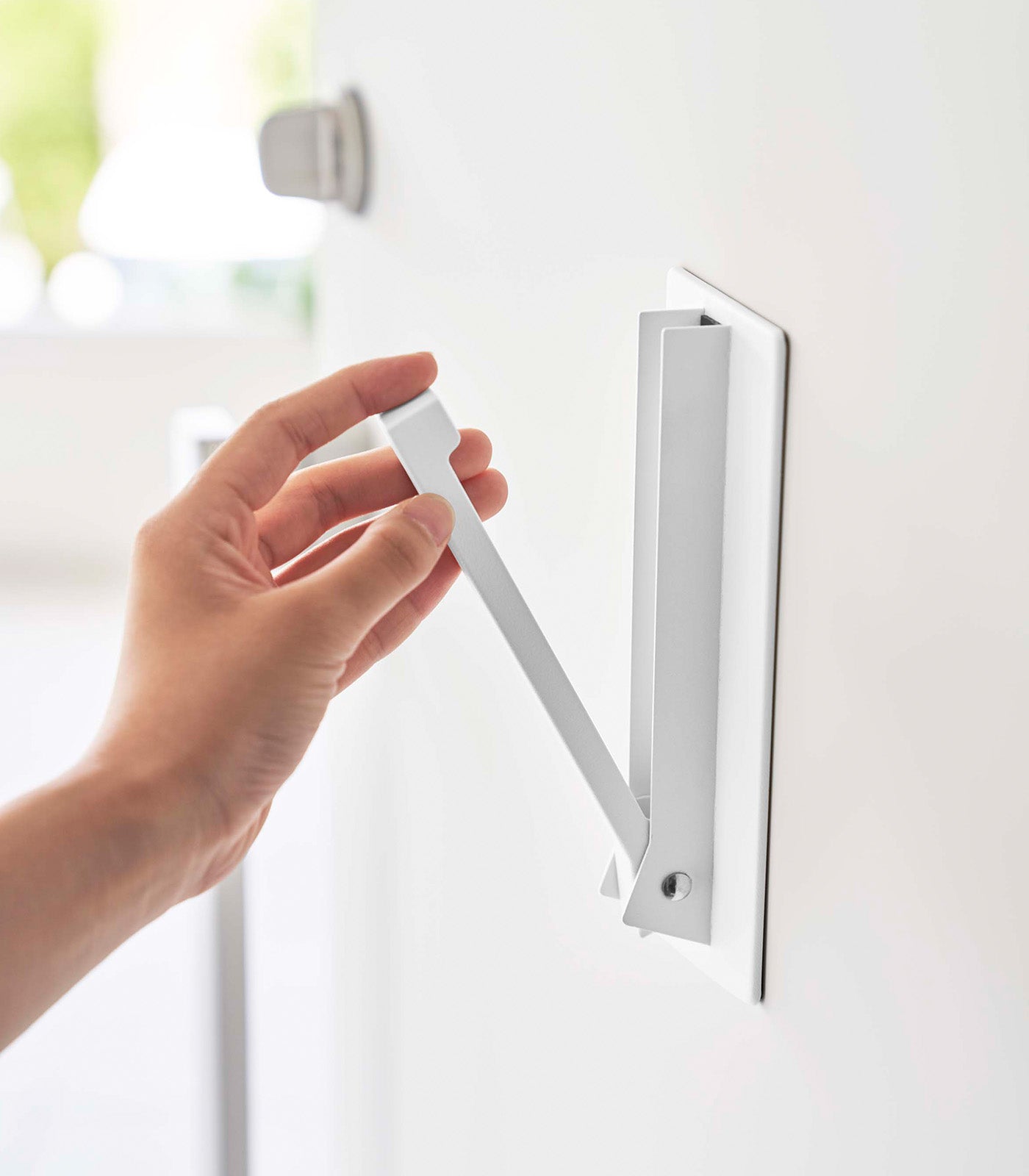 Space-Saving Foldable Hook with Magnetic Design