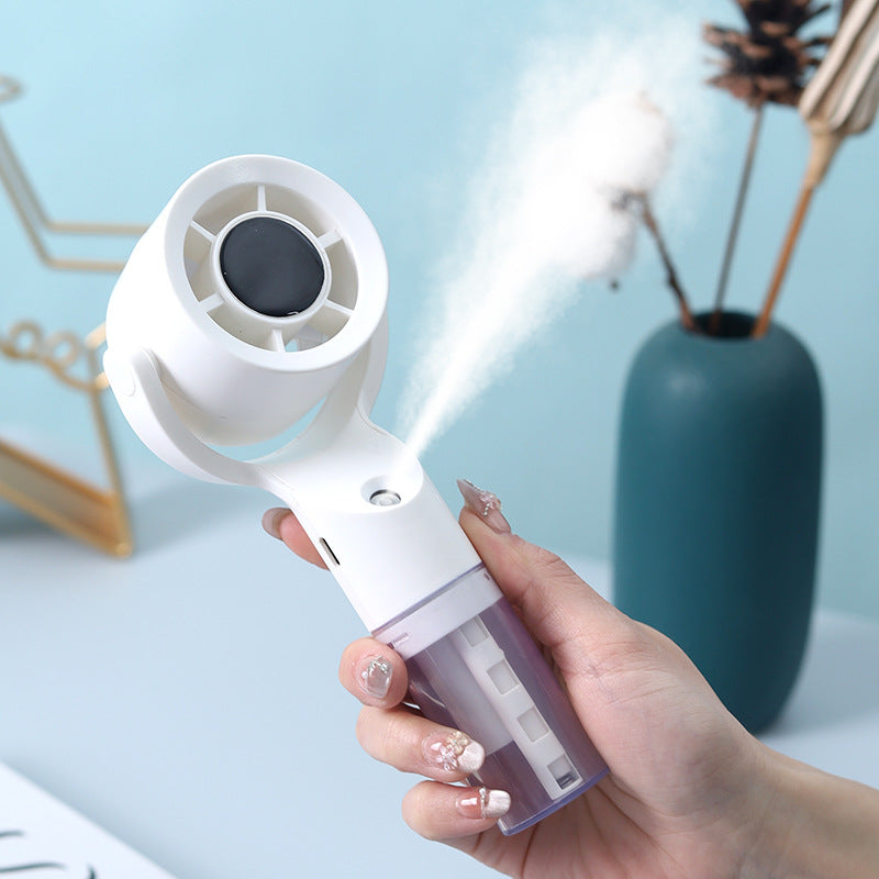 Handheld Portable Fan with Spray Function – Personal Cooling for Travel & Outdoors