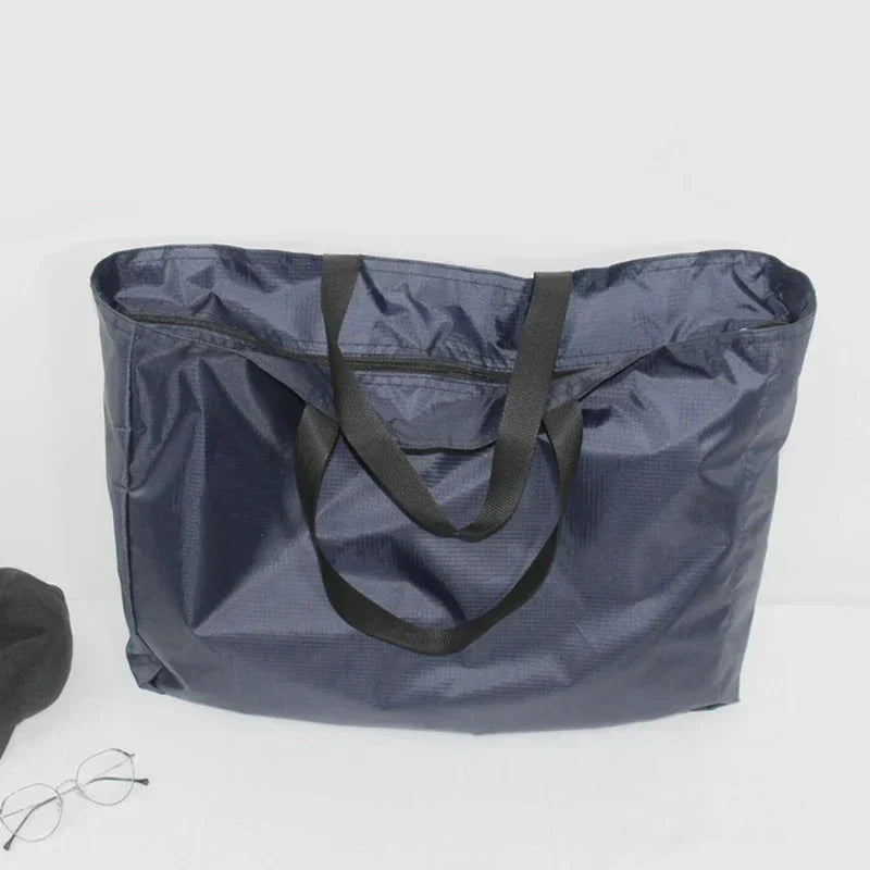 Water-Resistant Foldable Travel Bag - Available in 4 Sizes, Black and Blue