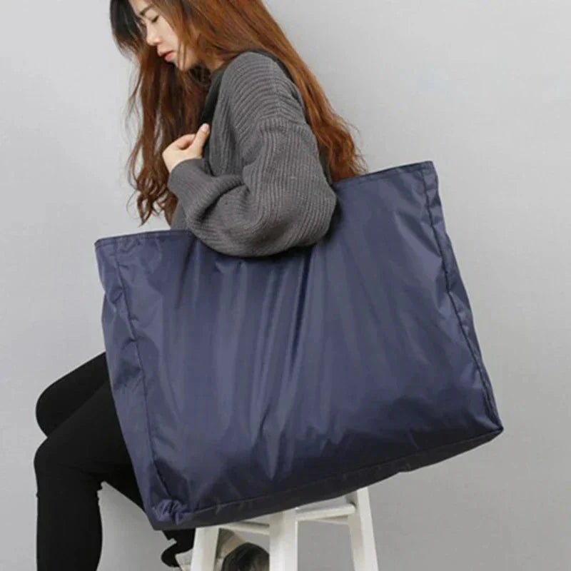 Water-Resistant Foldable Travel Bag - Available in 4 Sizes, Black and Blue