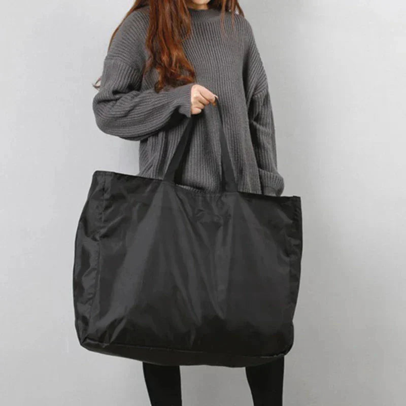 Water-Resistant Foldable Travel Bag - Available in 4 Sizes, Black and Blue
