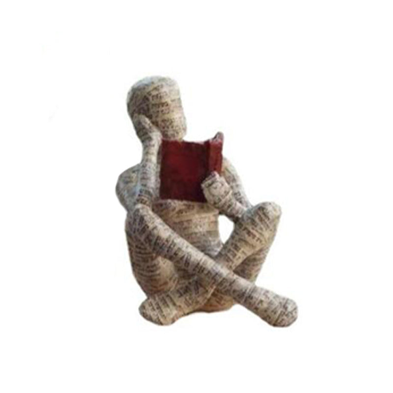 Resin Reading Statue Featuring Newspaper Print Design