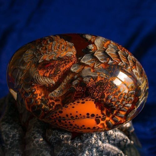 Crystal Dragon Egg with Intricate Dragon Figurine Inside