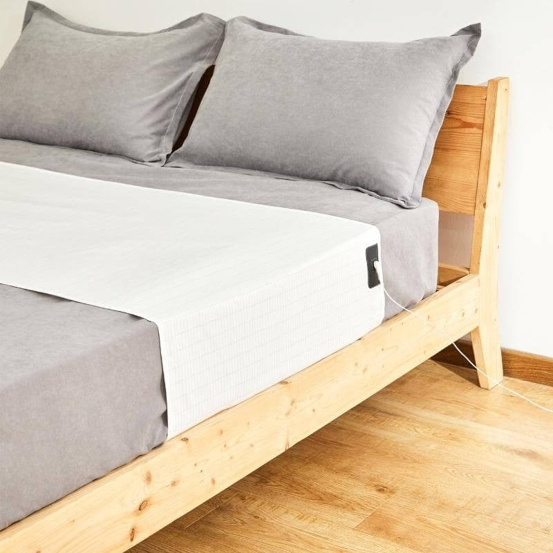 Grounding Bed Sheets to Reduce Static for Improved Sleep Quality