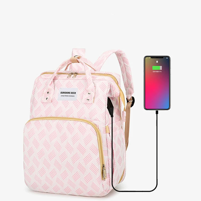 Versatile Diaper Backpack with Built-in Travel Crib Feature