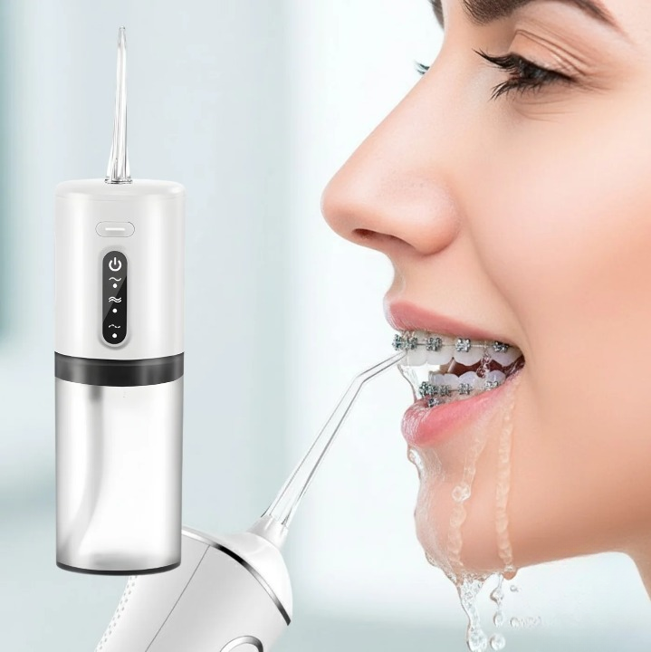 Water Flosser for Dental Care with Interchangeable Nozzles