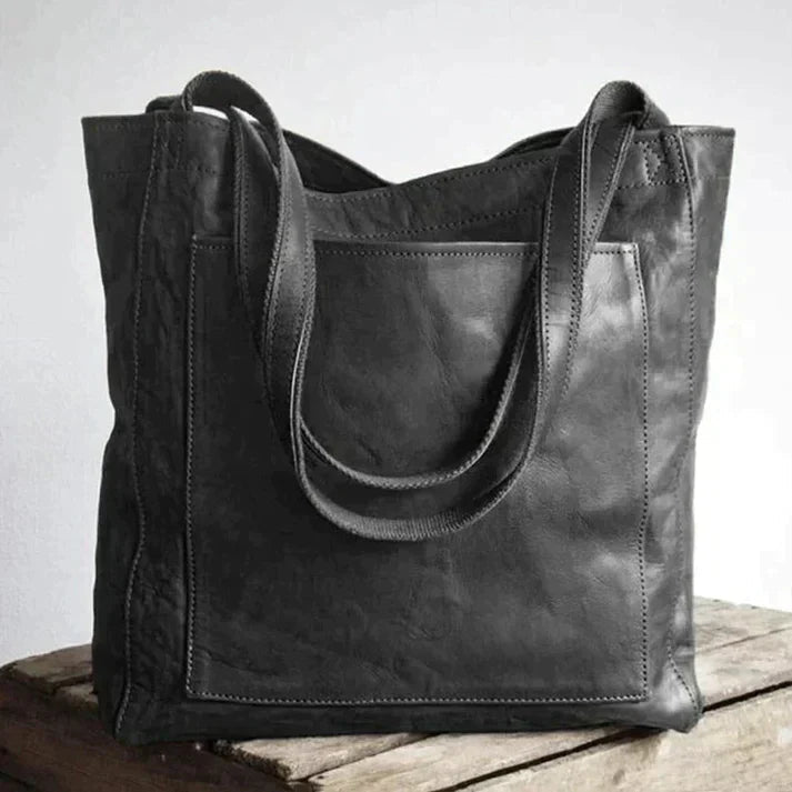 Chic Black Shoulder Bag with Versatile Design and Storage