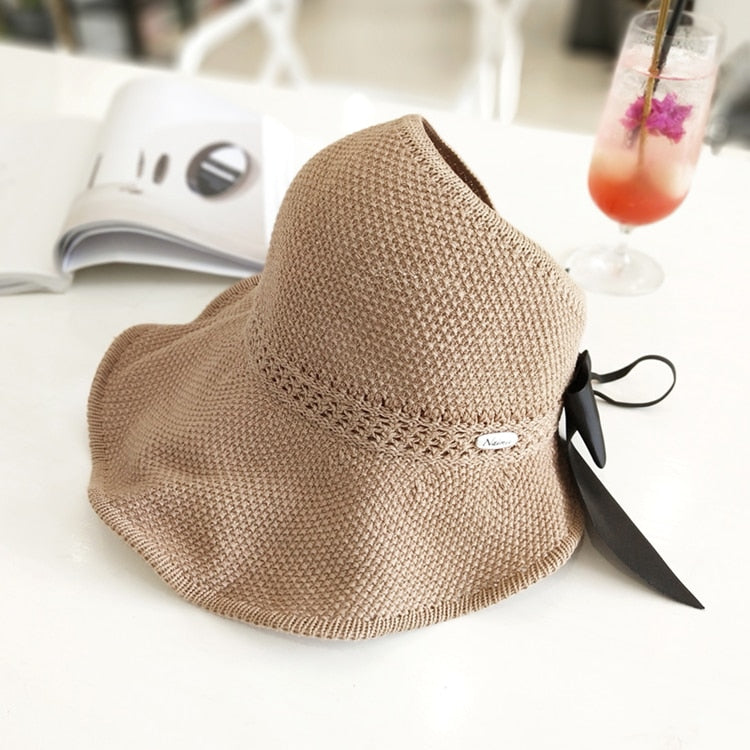 Women's Straw Hat Featuring Ponytail Cutout
