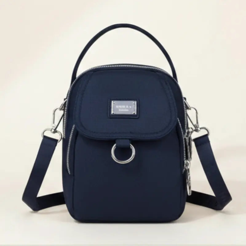 Water-Resistant Crossbody Bag with Multiple Pockets – Compact Design