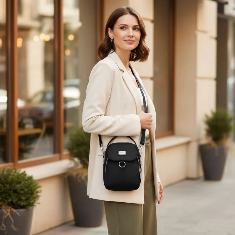 Water-Resistant Crossbody Bag with Multiple Pockets – Compact Design