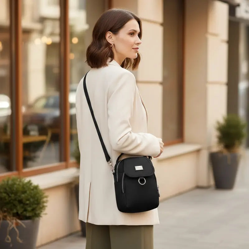 Water-Resistant Crossbody Bag with Multiple Pockets – Compact Design