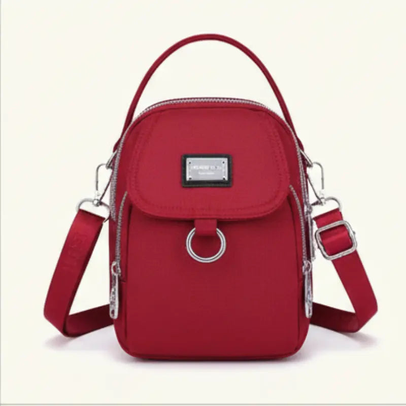 Water-Resistant Crossbody Bag with Multiple Pockets – Compact Design