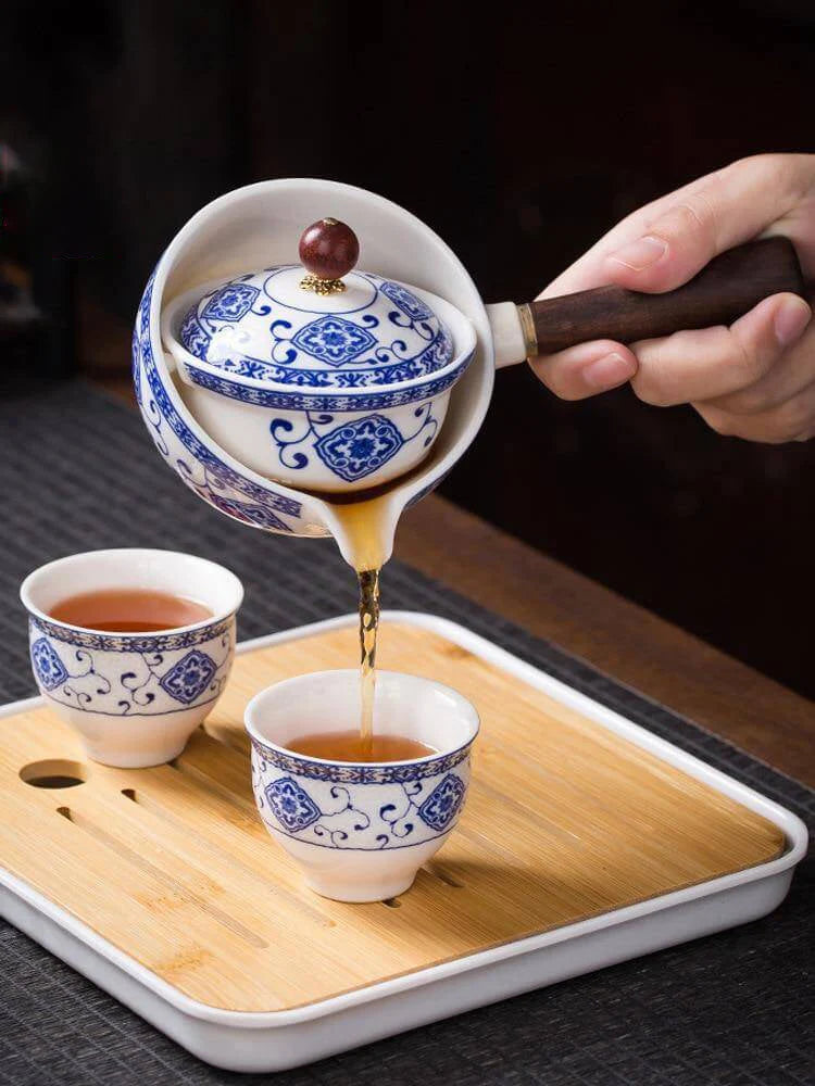 Ceramic Tea Set Rotating Infuser Four Cups Portable Bag