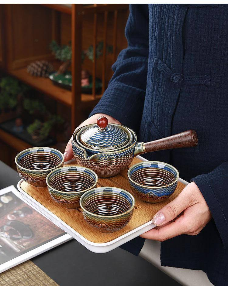 Ceramic Tea Set Rotating Infuser Four Cups Portable Bag