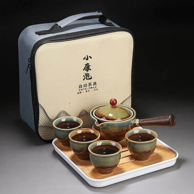 Ceramic Tea Set Rotating Infuser Four Cups Portable Bag