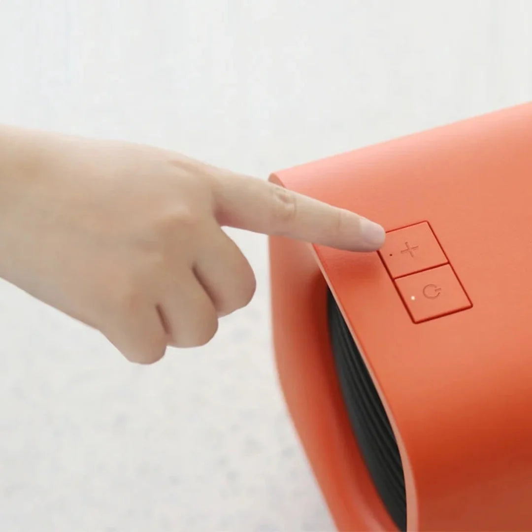 Portable Electric Heater 700W Compact Design with Protective Grille