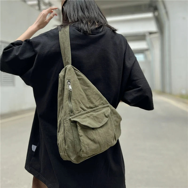 Sling Backpack Adjustable Strap Multiple Compartments Zippered Main Compartment