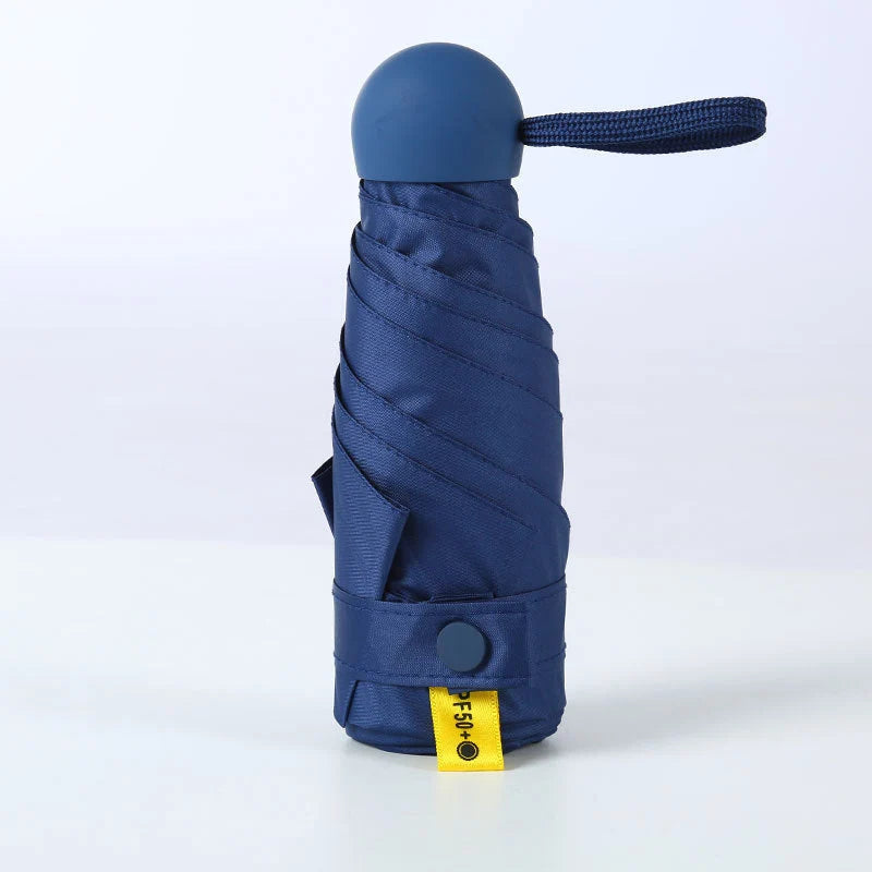 Travel Umbrella Compact Capsule UPF 50+ Wind-Resistant Canopy