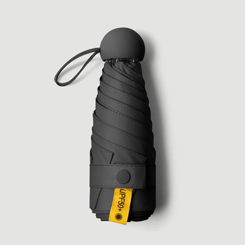Travel Umbrella Compact Capsule UPF 50+ Wind-Resistant Canopy