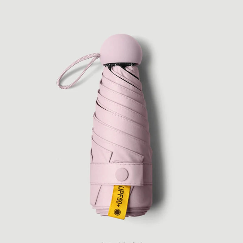 Travel Umbrella Compact Capsule UPF 50+ Wind-Resistant Canopy