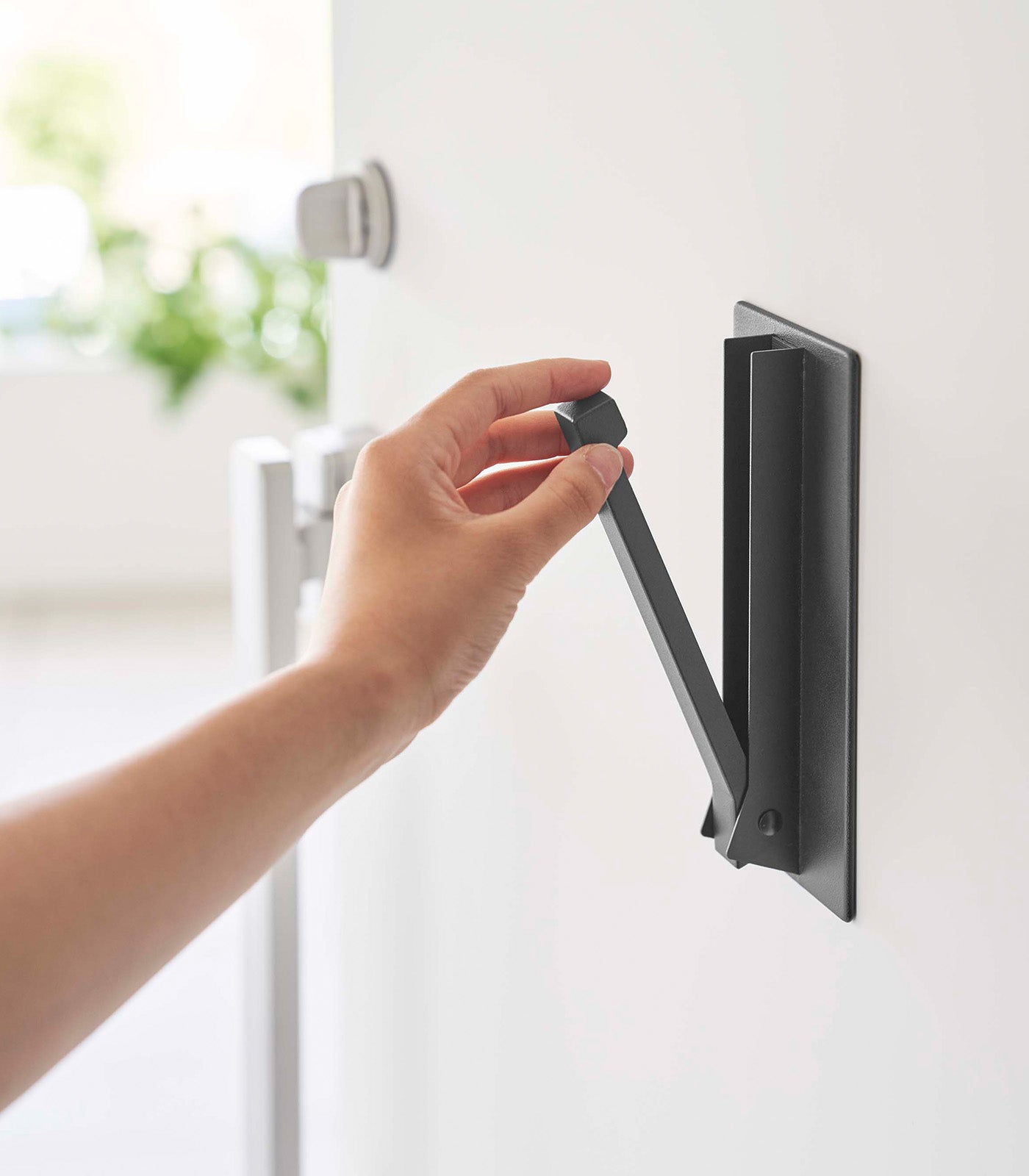 Space-Saving Foldable Hook with Magnetic Design