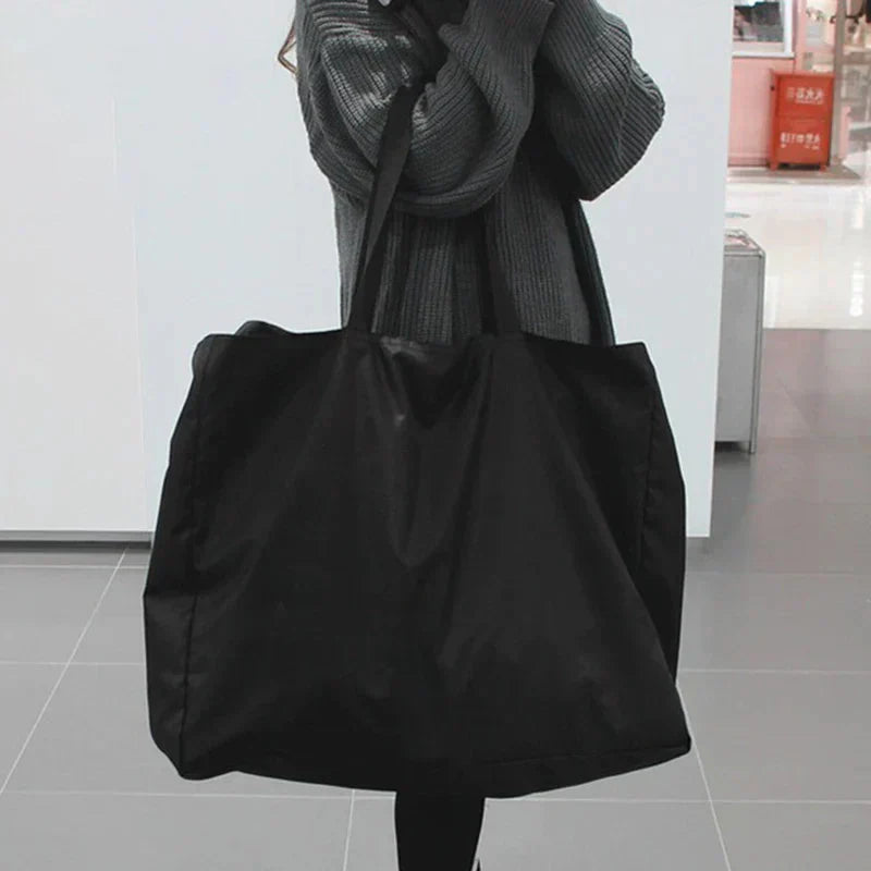 Water-Resistant Foldable Travel Bag - Available in 4 Sizes, Black and Blue