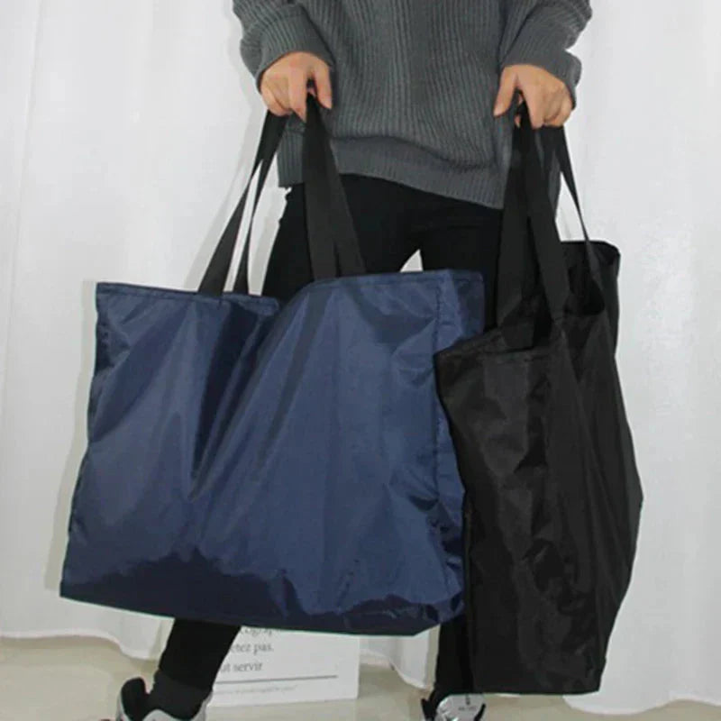 Water-Resistant Foldable Travel Bag - Available in 4 Sizes, Black and Blue