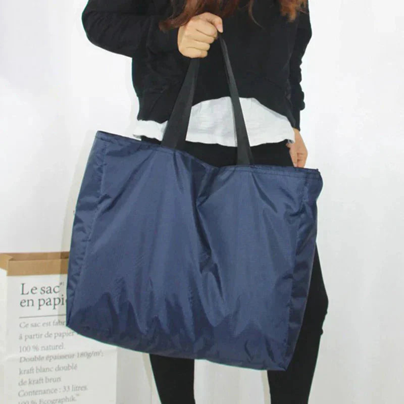 Water-Resistant Foldable Travel Bag - Available in 4 Sizes, Black and Blue