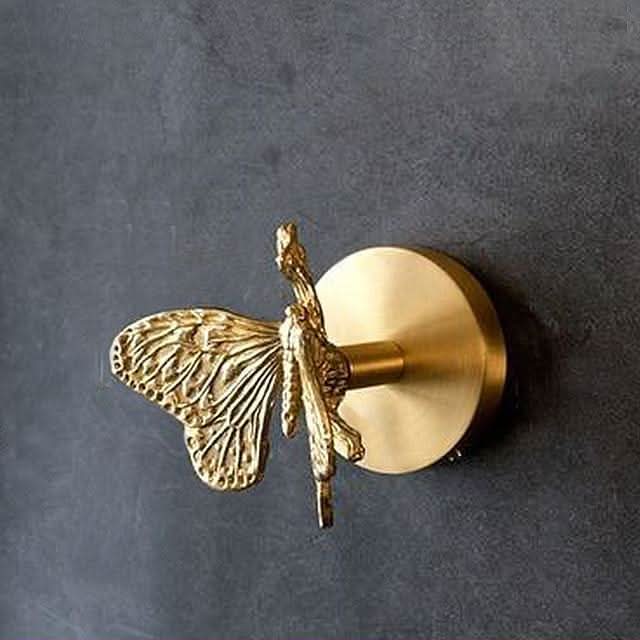 Brass Hooks Shaped Like Animal Heads for Entryway Organization