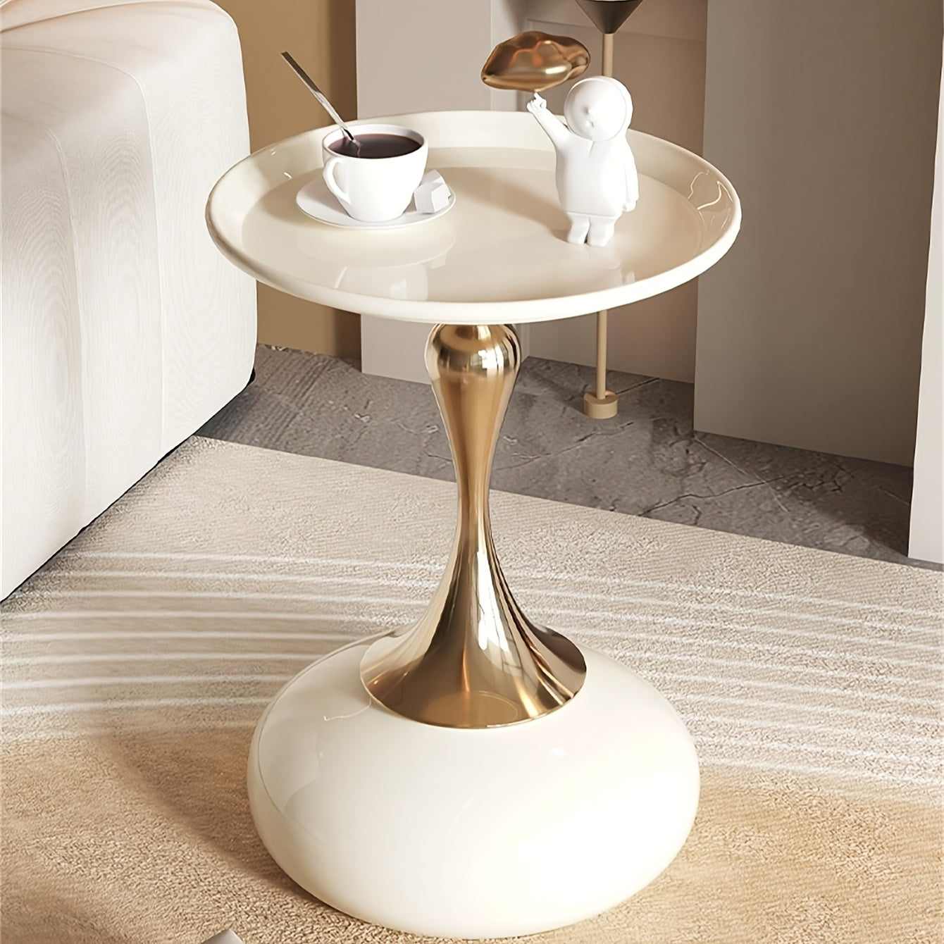 Stylish side table featuring a gold tulip-shaped base