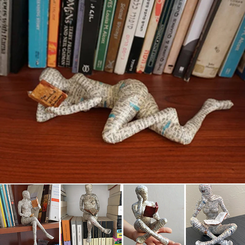 Resin Reading Statue Featuring Newspaper Print Design