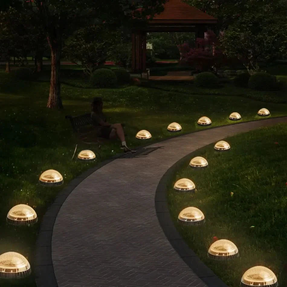 Solar-Powered Waterproof Ground Lights for Outdoor Spaces