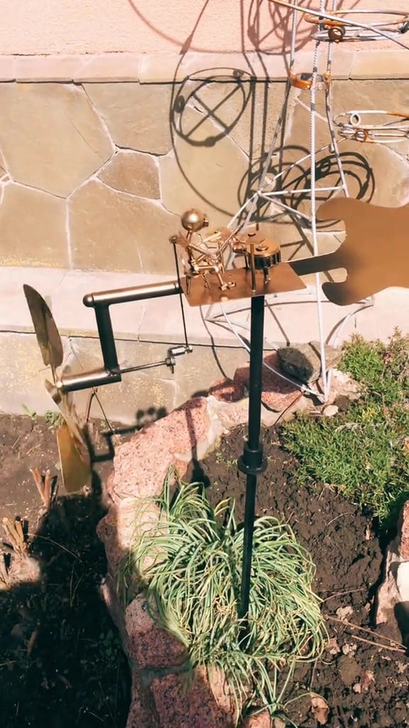 Metal Wind Spinner with Rock Band Theme – Durable Steel Garden Decor for Outdoors