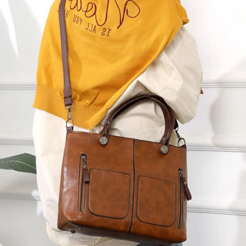 Stylish Leather Tote Bag Featuring Functional Front Pockets